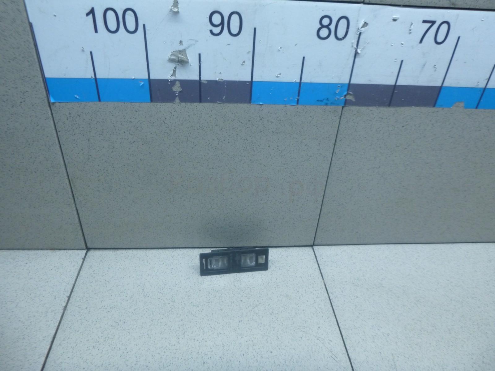 Фонарь подсветки номера