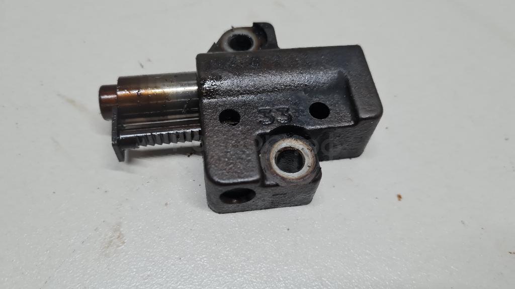 Натяжитель цепи