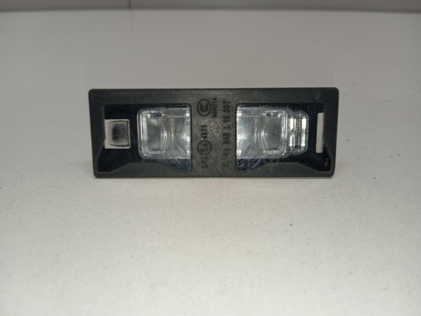 Фонарь подсветки номера